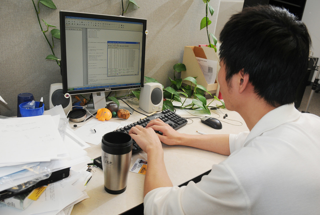 Computer science student at work